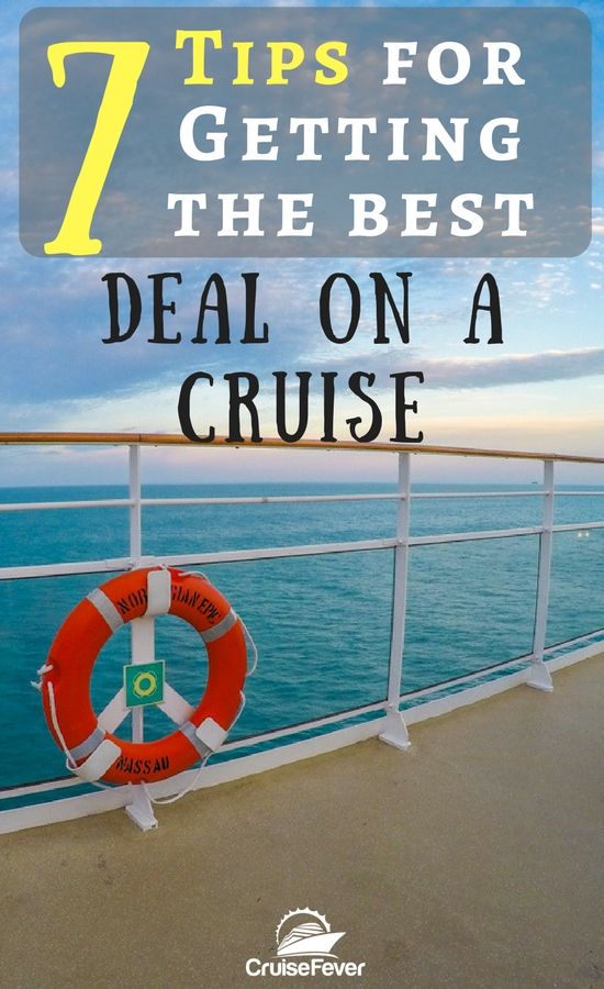 A person using a laptop to search for cruise deals online, with a cruise ship visible on the screen.