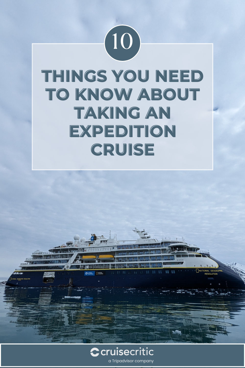 Expedition cruise ship near an icy shore with passengers in Zodiacs exploring